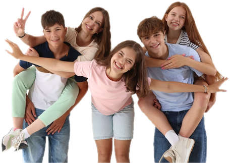 Smiling kids and teens piled together